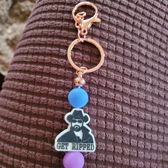 This a keychain with rip from Yellowstone on it . - Picture 2 of 2